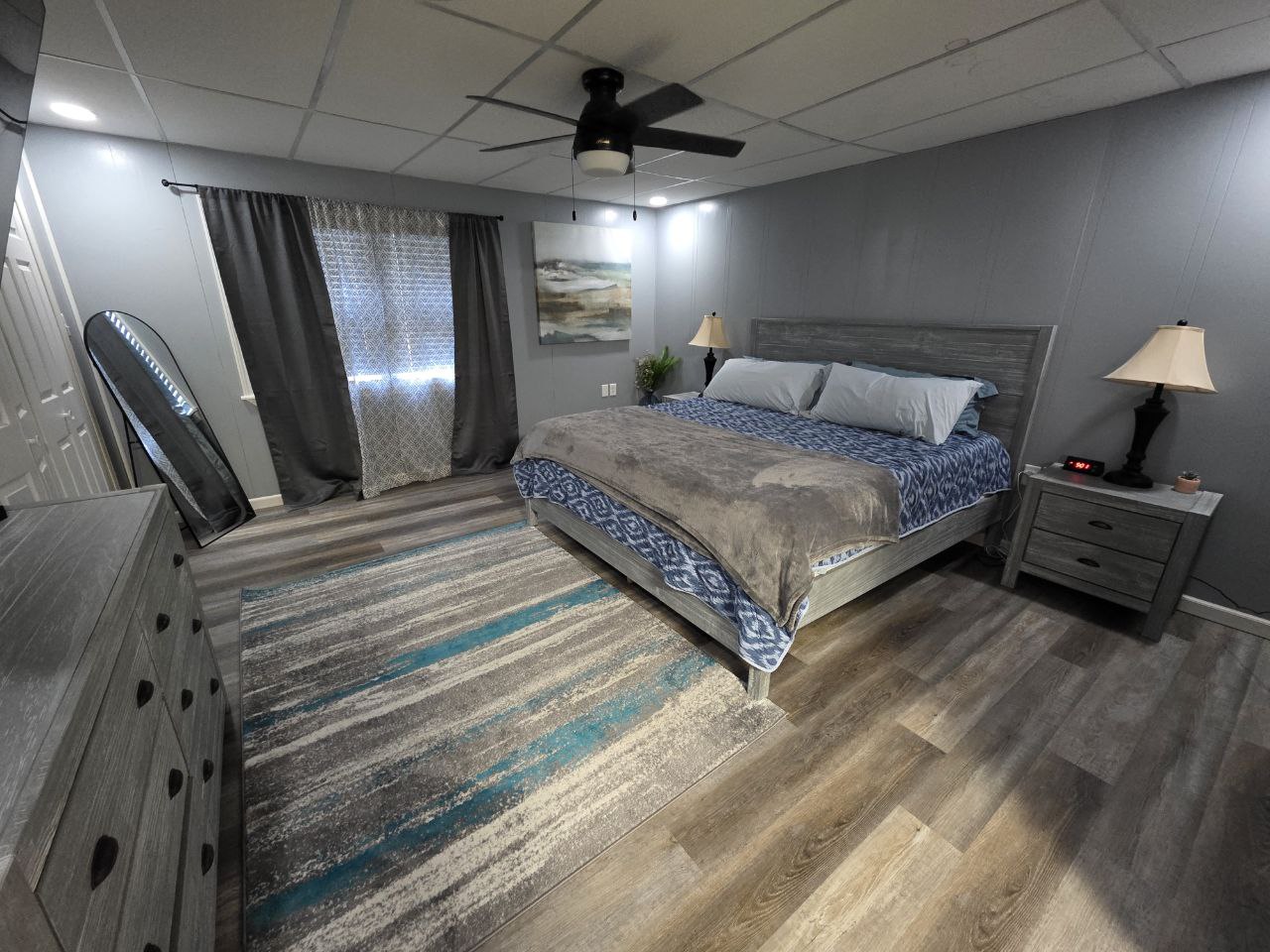 Master bedroom with king bed at Mountaineer Gold & Blue Retreat